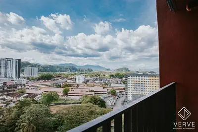 a view of a city from a balcony at Ipoh Town Piccadilly Premium Suites by Verve 3B2B in Gua Sai