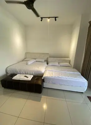 a large bed in a room with at Sentosa Grand Homestay in Kulim