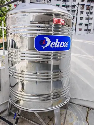 a large metal container sitting on the side of a street at Spacious 9 Rooms house 23paxQbay MallSpice Arena in Gelugor