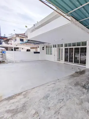 an empty parking lot in front of a building at Spacious 9 Rooms house 23paxQbay MallSpice Arena in Gelugor