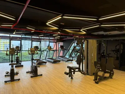 a gym with several treadmills and exercise bikes at N0ir Blanc Piccadilly Ipoh Town 3R2B 6-7pax in Ipoh
