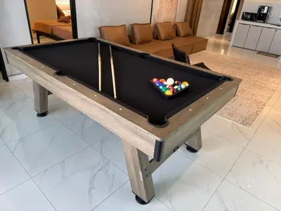 a pool table with cue balls on top of it at Rustic Vibe Pool Bungalow Karaoke 5R7B for 22pax in Ipoh