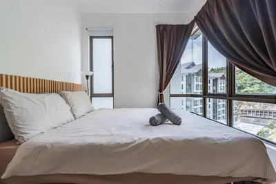 a bedroom with a bed with a large window at Serene Minimalist Family Retreat 2-7pax 8 min to BoH in Brinchang