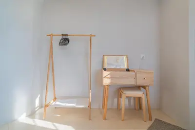 a desk with a mirror and a chair in a room at Stylish 3BR Stay Near Gurney Drive Free Parking in George Town