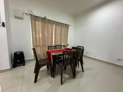 a dining room table with black chairs and a red table cloth at Raub Colonial 208 Homestay in Raub