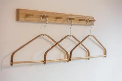 a metal rack with three glass panels on a wall at Serene Japandi & Zen Family Retreat 2-7 pax with Comfortable Living Space in Tanah Rata