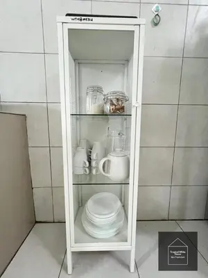 a white cabinet with a toilet in a bathroom at Ipoh Musllim Homestay Meru Tropika - 3 Bedrooms in Ipoh