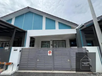 a blue and white house with a gate at Ipoh Musllim Homestay Meru Tropika - 3 Bedrooms in Ipoh