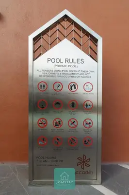 a sign in a wall with signs on it at JOMSTAY - Piccadilly Greentown Ipoh in Ipoh