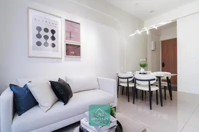 a living room with a couch and a table at JOMSTAY - Piccadilly Greentown Ipoh in Ipoh
