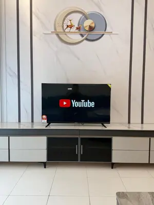 a tv sitting on top of a table in a room at Ayaan Platinum2 Homestay at Tanah Rata with Private Parking and Air Hockey Games in Tanah Rata