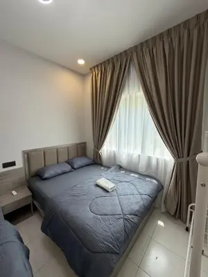 a bedroom with a bed and a large window at Ayaan Platinum2 Homestay at Tanah Rata with Private Parking and Air Hockey Games in Tanah Rata