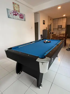 a pool table in a living room with at AYAAN Freesia Snooker House at Quintet Private Parking in Tanah Rata