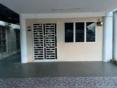 a building with a door with wine racks on it at Homestay Adelia SI in Seri Iskandar