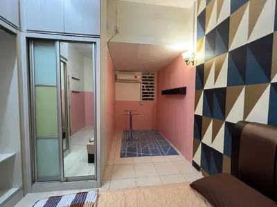 a room with a hallway with a mirror at Homestay Adelia SI in Seri Iskandar