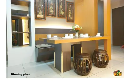 a dining table with two stools in a room at H2H- Dreamy Home - Majestic Ipoh - 7 pax in Ipoh