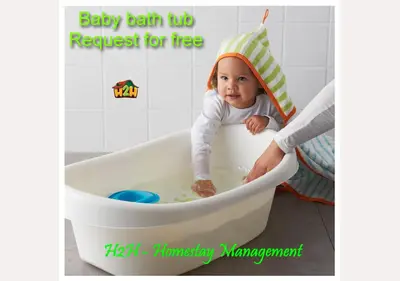 a baby in a bath tub with a towel on its head at H2H- Dreamy Home - Majestic Ipoh - 7 pax in Ipoh