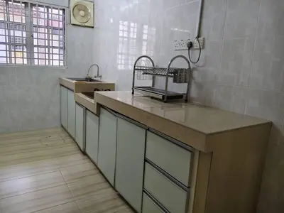 a kitchen with a sink and a counter top at Warmy 4 Bedrooms Double Storey Homestay, Few mins to Town, by MR HOMESTAY in Teluk Intan