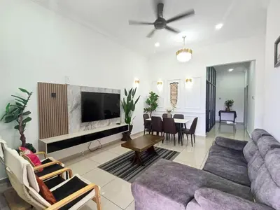 a living room with a couch and a table at Scafie apartment 001