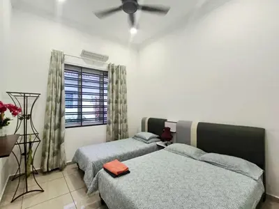 a bedroom with two beds and a window at Scafie apartment 001