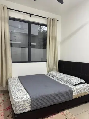 a bed in a room with a window at RIADAH DALAM IBADAH by Rumah Che Matsunami in Brinchang