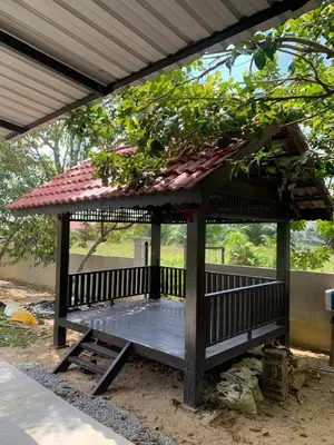 a gazebo with a roof and a table at Homestay D'Kutan Bandar Baharu Kedah in Bandar Baharu