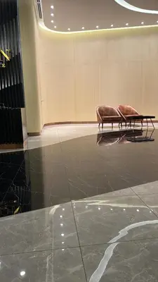 a couple of benches sitting in a room at Landmark View At Axon Residence Bukit Bintang Pavilion in Gua Sai