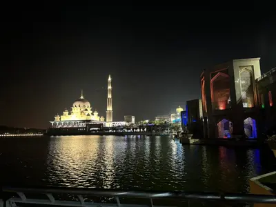 a view of a city at night with a mosque at Landmark View At Axon Residence Bukit Bintang Pavilion in Gua Sai