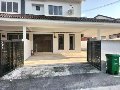 a house with a gate in front of a garage at Lahat Homestay in Lahat