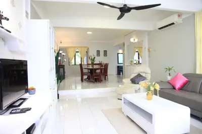 a living room with a couch and a table at Isabella Villa George Town Penang in George Town
