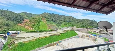 a view of the ruins of a temple on a mountain at Mary Apt @ Equatorial Hill Resort in Cameron Highlands