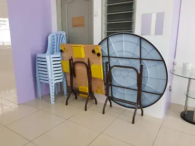 a room with two chairs and a mirror at Comfort On the Hill in Cameron Highlands