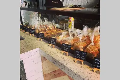 a bakery with many different types of pastries on display at Kim Haus Loft in George Town