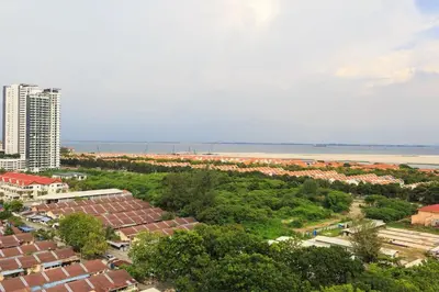 an aerial view of a city and the ocean at 118 Residences by Travovo in George Town