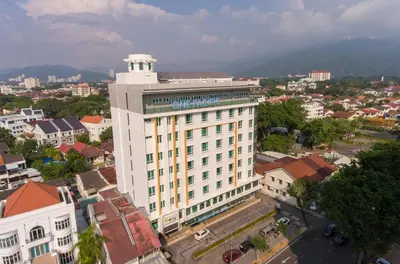 an overhead view of a building in a city at One Pacific Hotel and Serviced Apartments in George Town