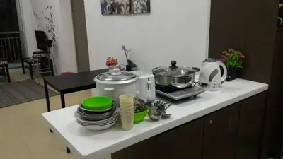 a kitchen counter with dishes and appliances on it at Famous night market Cameron Highlands Nearby in Cameron Highlands