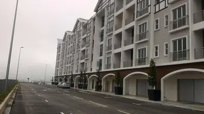 an empty street in front of a large building at Famous night market Cameron Highlands Nearby in Cameron Highlands