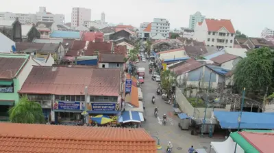 an overhead view of a city street with buildings at Broadway Budget Hotel in George Town