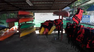 a playground with a bunch of slides and kayaks at Penang Tg Bungah Permai Ria Apartment in Tanjung Bungah