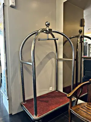 a metal frame bunk bed in a room at Double Happiness Hotel in Seri Manjung