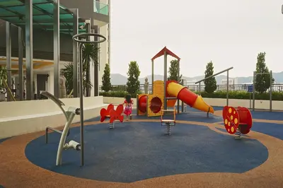 a playground in a building with children playing on it at The Majestic Ipoh by The Osborne in Ipoh