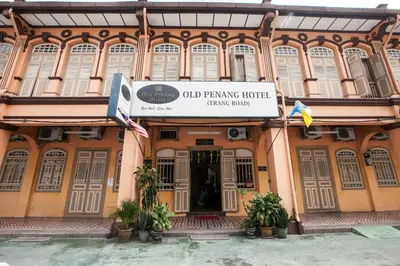 a building with a sign in front of it at Old Penang Hotel - Trang Road in George Town