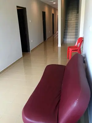 a red couch in a hallway with two red chairs at Lunas Bliss in Lunas
