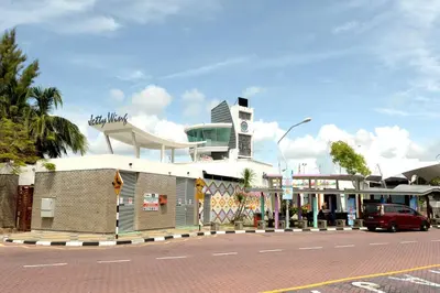 a building on the side of a street at Brezza Hotel Lumut in Lumut