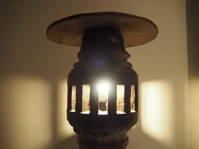 a light that is attached to a wall at Brick Box Hotel @ Oldtown Ipoh in Ipoh