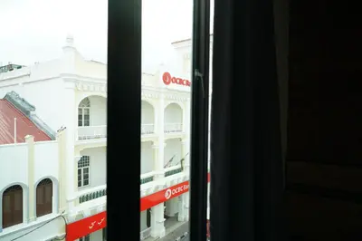 a view of a building from a window at Brick Box Hotel @ Oldtown Ipoh in Ipoh