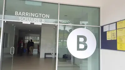 an entrance to a building with a b sign on it at Feel Homestay in Cameron Highlands
