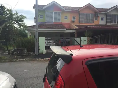 a red car parked in front of a house at Kak's House Musl!m Only in Ipoh