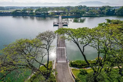an aerial view of a bridge over a lake at Golden Roof Hotel, Seri Iskandar in Seri Iskandar