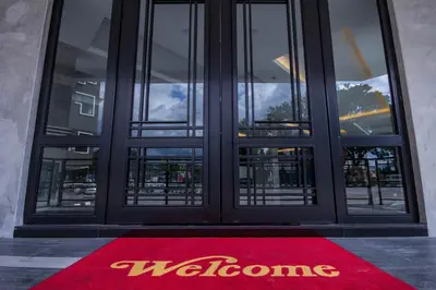 a welcome mat in front of a door with a welcome sign at Manhattan Hotel Ipoh in Ipoh